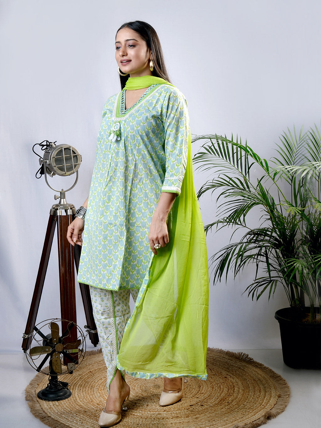 Green kurta set with dhoti pant, side view