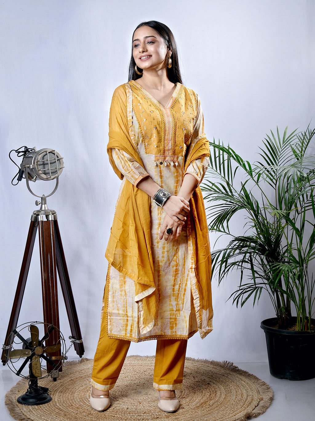 Mustard kurta set with dupatta, side view