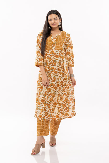 Ekisha's women cotton printed mustard multicolor kurta and pant set, front view